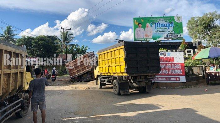 Jalan Rusak di Mantimin, Kabupaten Balangan, Kalimantan Selatan, Satu Truk Terjebak di Lokasi – Pos Banjarmasin